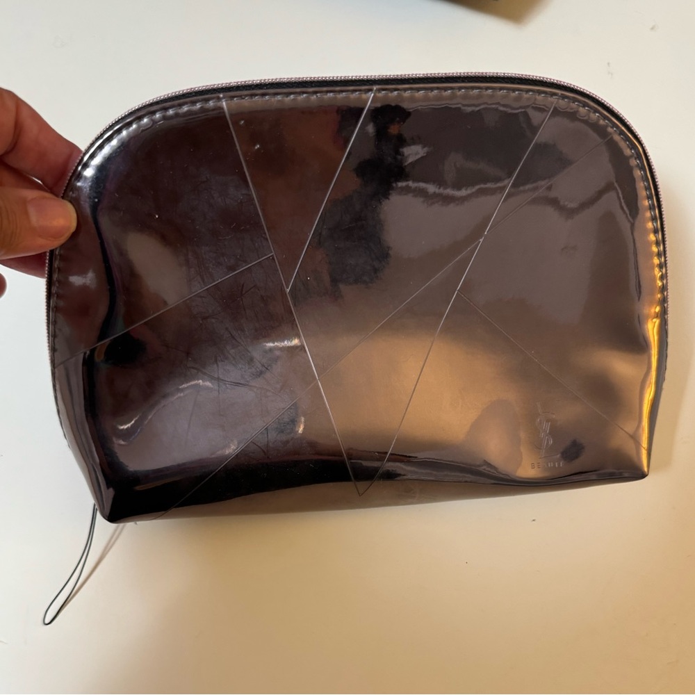 YSL NWOT beaute bag with zipper metallic pink